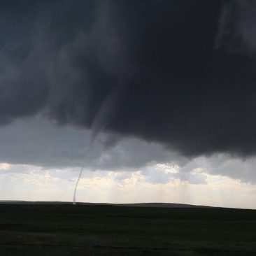 Brief tornado with thin condensation tube.