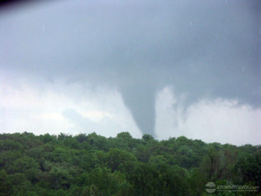 tornado passing over hills