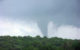 tornado passing over hills