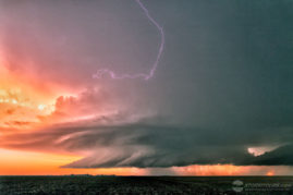 Lightning shoots out of supercell thunderstorm