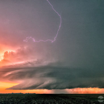 Lightning shoots out of supercell thunderstorm