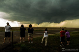 storm chasers watching tornado